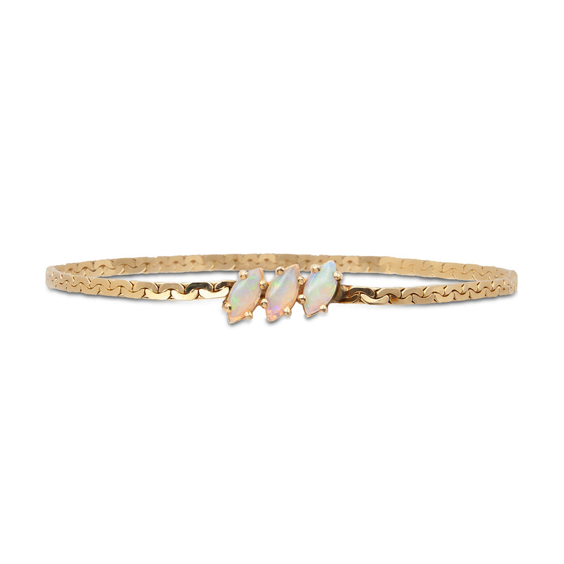 A vintage 14 karat yellow gold flat link bracelet with 3 marquise Australian opals (Front).