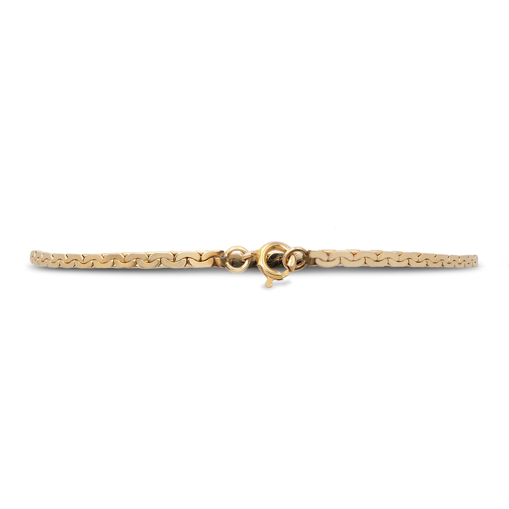 A vintage 14 karat yellow gold flat link bracelet with 3 marquise Australian opals (Back).