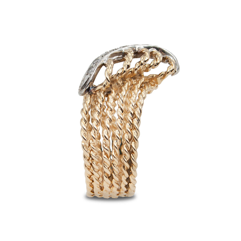 Vintage handmade 14k gold twisted rope ring with diamonds (profile view).