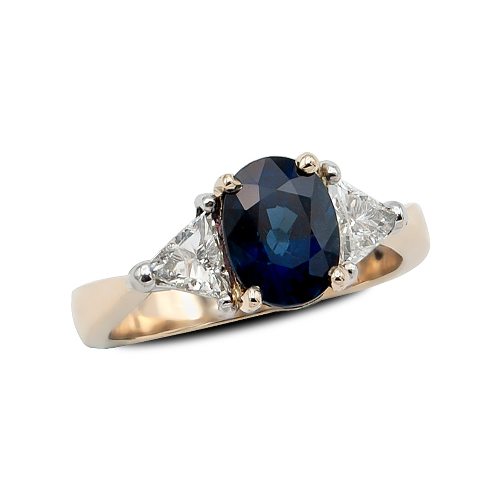 Custom Oval Sapphire and Trillion Diamond Three Stone Ring