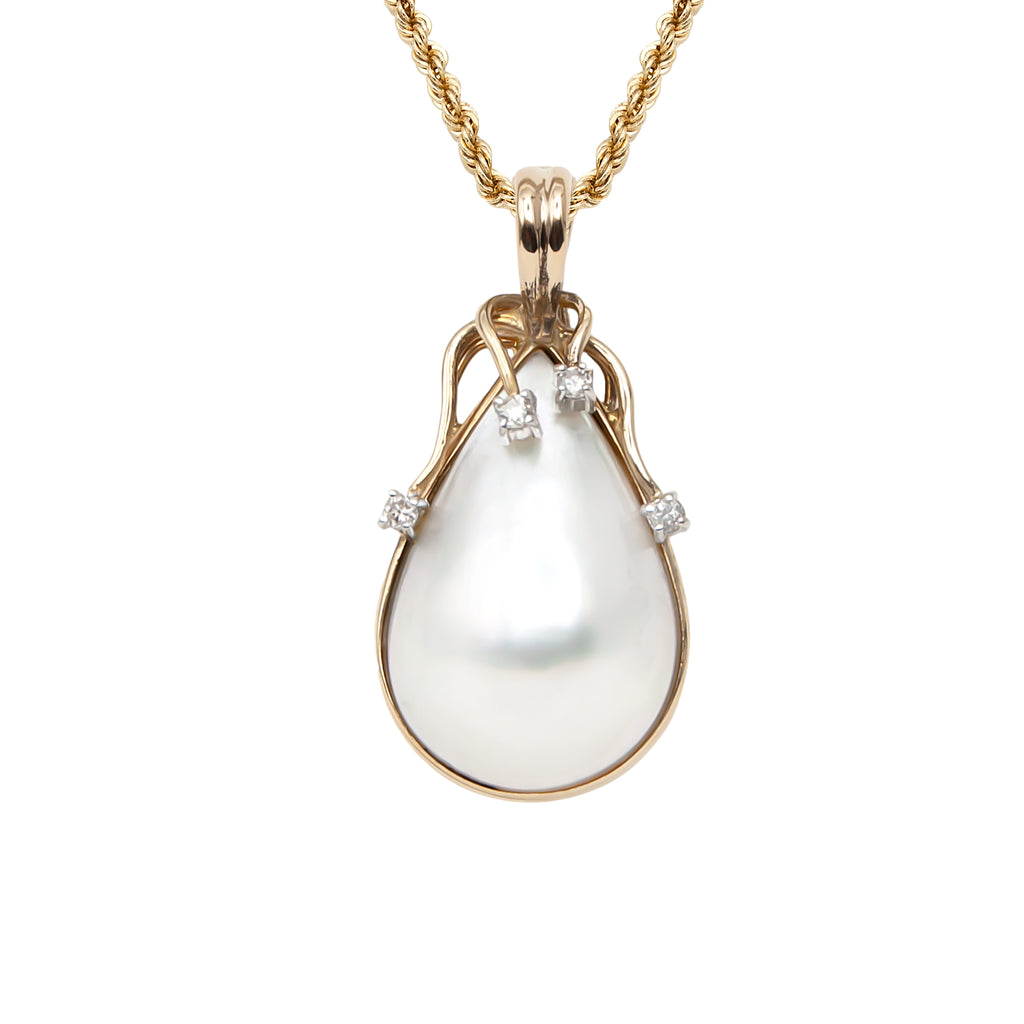 Vintage 14 Karat Gold Pear Shape Pearl and Diamond Pendant