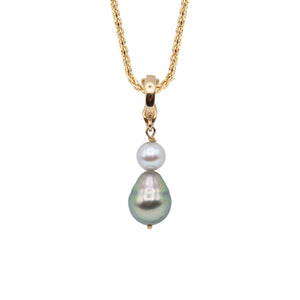 A 14 karat yellow gold pendant with a spherical gray Akoya pearl and pear shaped Tahitian pearl (on chain).