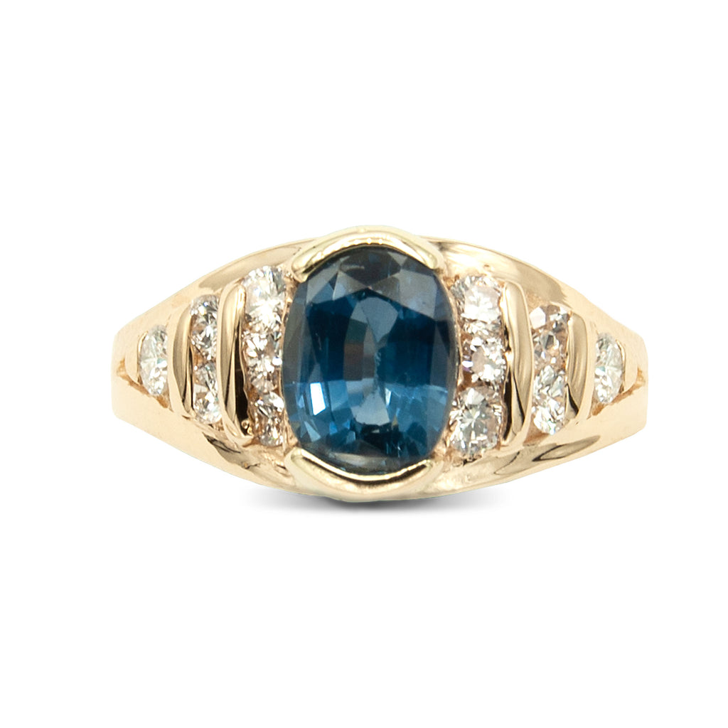 14 Karat Natural Oval Blue Sapphire Ring with Brilliant Cut Diamonds Ring.