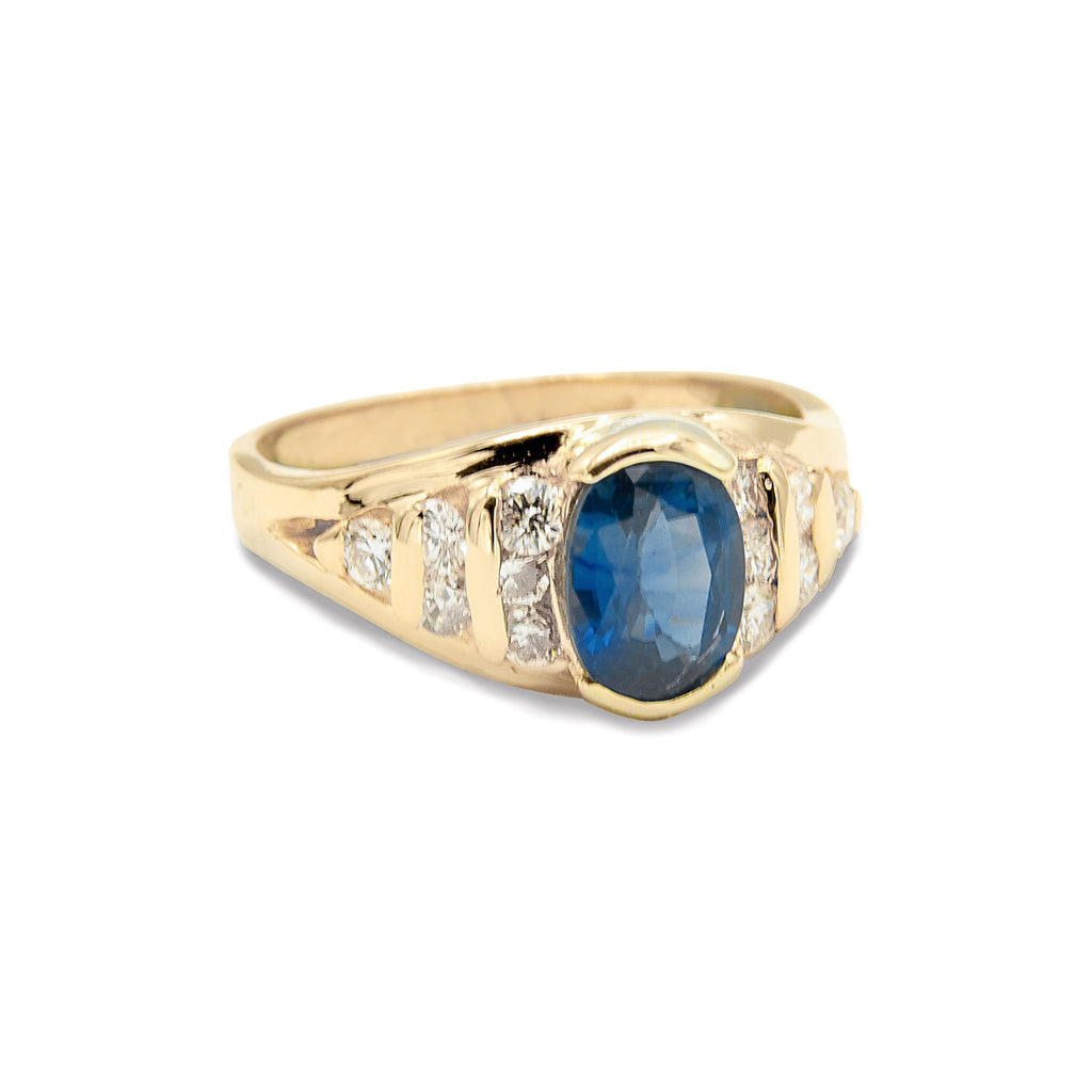 14 Karat Natural Oval Blue Sapphire Ring with Brilliant Cut Diamonds Ring.