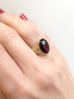 Antique Oval Cabochon Garnet Ring Flanked by Owls