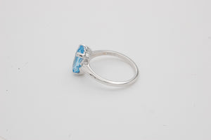 Oval Sky Blue Topaz Solitaire Ring