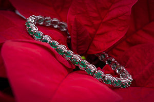 14 Karat White Gold Bracelet Prong Set with Fine Quality Natural Emeralds and Diamonds Weighing Totally 791/100 Carats Bracelet.