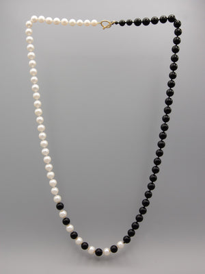 Handmade unique silver and black jewelry, made with silver pearls and black  onyx tube beads
