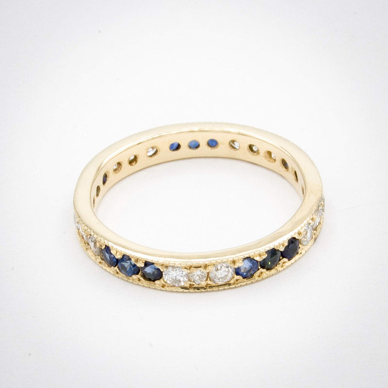14 Karat Gold Sapphire and Diamond Eternity Ring